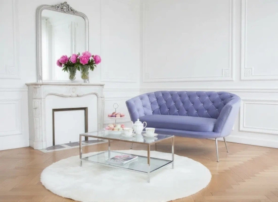 Tapicerowana i pikowana sofa muszelka ARISTA